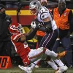 Kansas City, MO - 1/20/2019 - (4th quarter) New England Patriots tight end Rob Gronkowski (87) out wrestles Kansas City Chiefs defensive back Eric Berry (29) for the pass reception on the New England Patriots last touchdown drive late in the fourth quarter. The Kansas City Chiefs host the New England Patriots in the AFC Championship game at Arrowhead stadium. - (Barry Chin/Globe Staff), Section: Sports, Reporter: James M. McBride, Topic: 21Patriots-Chiefs, LOID: 8.5.157043654.