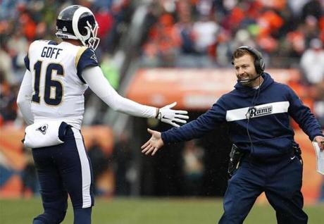 Los Angeles Rams head coach Sean McVay celebrates with quarterback Jared Goff (16) after a touchdown during the first half of an NFL football game against the Denver Broncos, Sunday, Oct. 14, 2018, in Denver. (AP Photo/Joe Mahoney)

