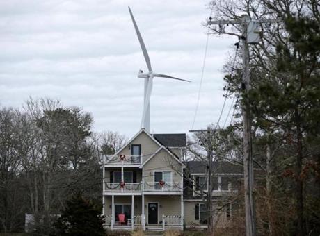 01/23/2019 Falmouth MA - A wind turbine looms over the Craggy Ridge neighborhood in West Falmouth. Opponents of the town of Falmouth's wind turbines,have complained, that they are eyesores, and even cause neighbors physical harm. .Jonathan Wiggs/Globe StaffReporter:Topic:
