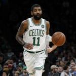Boston Celtics' Kyrie Irving brings the ball up court during the second quarter of an NBA basketball game against the Miami Heat Monday, Jan. 21, 2019, in Boston. (AP Photo/Winslow Townson)