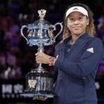 Naomi Osaka poses with trophy after defeating Petra Kvitova in the women?s Australian Open.