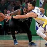 Boston, MA - 1/26/2019 - (4th quarter) Boston Celtics guard Kyrie Irving (11) loses the ball as Golden State Warriors guard Stephen Curry (30) pokes the ball away oaths play late in the fourth quarter. The Boston Celtics host the Golden State Warriors at TD Garden. - (Barry Chin/Globe Staff), Section: Sports, Reporter: Adam Himmelsbach, Topic: 27Warriors-Celtics, LOID: 8.5.195486713.