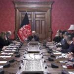 Afghan President Ashraf Ghani, center, spoke to US peace envoy Zalmay Khalilzad, third left, at the presidential palace in Kabul. 