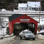 Woodstock, VT. 01/16/19- A large pickup truck exits the Taftsville Covered Bridge in Woodstock. Carbon emissions have risen 16 percent above the 1990 levels in Vermont, some of the reasons are aging gas-guzzling pickups, wood-buriing stoves and drafty old homes. Photo by John Tlumacki/Globe Staff(metro)