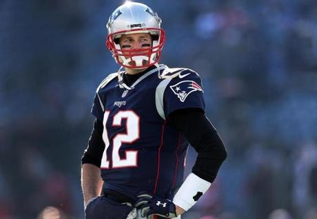 Foxborough, MA 12-30-18: Patriots quarterback Tom Brady is pictured on the field during pre game warmups, the metal on the brace he wears is visible at the top of his sock. The New England Patriots hosted the New York Jets in a regular season NFL football game at Gillette Stadium. (Jim Davis/Globe Staff)
