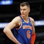 FILE - In this Jan. 25, 2018, file photo, New York Knicks forward Kristaps Porzingis, of Latvia, reacts after fouling out during the second half of the team's NBA basketball game against the Denver Nuggets on Thursday,, in Denver. The Knicks agree to trade injured star Kristaps Porzingis to Dallas Mavericks on Thursday, Jan. 31, 2019. (AP Photo/David Zalubowski, File)