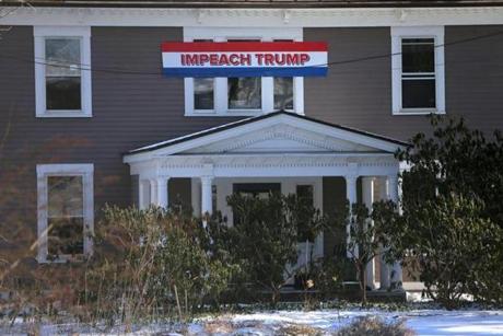 Dan Chiasson of Wellesley doesn?t want to take down his ?Impeach Trump? banner.
