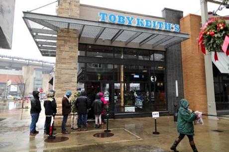 People waited in line to get into Toby Keith?s at Patriots Place in 2016. 
