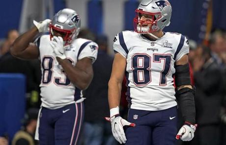 SUPER BOWL LIII SLIDER 02-03-19: Atlanta, GA: Patriots TE Rob Gronkowski smiles at fans in the end zone are screaming his name duirng pre gae warmups. The New England Patriots met the Los Angeles Rams in Super Bowl LIII at Mercedes-Benz Stadium. (Jim Davis /Globe Staff)
