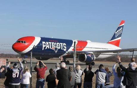 The Super Bowl-winning Patriots arrived at TF Green airport in Rhode Island. 
