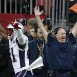 New England Patriots' Duron Harmon (21) and head coach Bill Belichick celebrate after the NFL Super Bowl 53 football game against the Los Angeles Rams Sunday, Feb. 3, 2019, in Atlanta. The Patriots won 13-2. (AP Photo/Patrick Semansky)