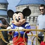 Julian Edelman (left), Tom Brady, and Mickey Mouse took part in a parade Monday at Walt Disney World.