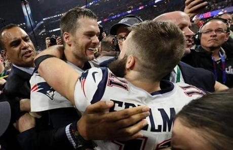Atlanta, GA - 2-03-19 - Tom Brady and Julian Edelman embrace after the game. The New England Patriots play the Los Angeles Rams in Super Bowl LIII at Mercedes-Benz Stadium. (Barry Chin/Globe Staff)
