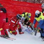Personell attend to Lindsey Vonn after she crashed in the super-G event at the world championships. 