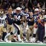Ty Law heads for the end zone after his second-quarter interception of Kurt Warner inSuper Bowl XXXVI in 2002. 