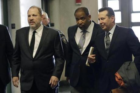 Harvey Weinstein (left) went into court last month with Winthrop House faculty dean Ronald S. Sullivan Jr. (center).

