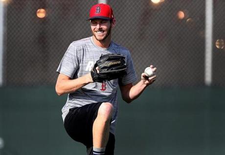 Fort Myers , FL - 2/12/2019 - Boston Red Sox starting pitcher Chris Sale throws after completing his morning physical. Boston Red Sox pitchers and catchers reported today for physicals for Red Sox Spring Training at Jet Blue Park in Fort Myers, FL. - (Barry Chin/Globe Staff), Section: Sports, Reporter: Peter Abraham, Topic: 12Red Sox, LOID: .
