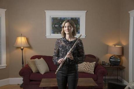 Elizabeth Rowe, the Boston Symphony Orchestra's principal flutist, at her home in Boston in November.  
