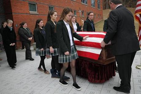 Ursuline Academy students were pallbearers for veteran Douglas W. Benson, who died without any known family.
