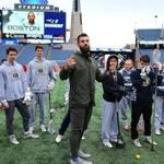 Foxborough 02/15/19 Paul Rabil, one of the founders of the new Premier Lacrosse League chats with Foxboro High School lacrosse players on the field at Gillette Stadium. Photo by John Tlumacki/Globe Staff(sports)