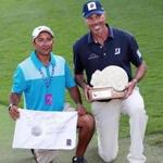 Matt Kuchar (right) with local caddie David Giral Ortiz, who agreed to payment terms before the tournament in Mexico in November.