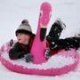 Sheamus Newell, 5, was having fun playing in the snow with his inflatable an inflatable flamingo Monday at South Boston?s Marine Park.