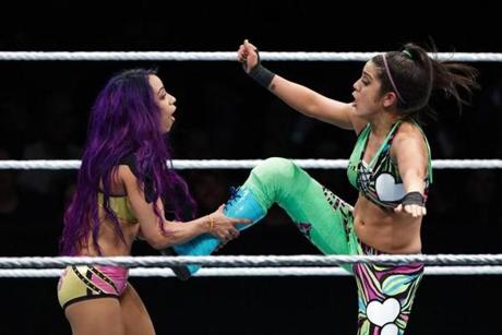 Sasha Banks (left) in action against Bayley during a WWE match last year. The duo is now WWE women?s tag team champions. 
