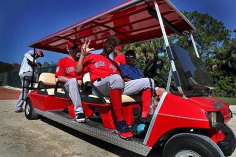 Fort Myers , FL - 2/16/2019 - (Day 5) (HOLD FOR STORY BY PETE ABRAHAM) Boston Red Sox pitcher David Price waves a pitchers board a golf cart that will take them back to the clubhouse. Boston Red Sox pitchers and catchers workout at Jet Blue Park in Fort Myers, FL. - (Barry Chin/Globe Staff), Section: Sports, Reporter: Peter Abraham, Topic: 17Red Sox, LOID: 8.5.416616478.

