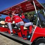 Fort Myers , FL - 2/16/2019 - (Day 5) (HOLD FOR STORY BY PETE ABRAHAM) Boston Red Sox pitcher David Price waves a pitchers board a golf cart that will take them back to the clubhouse. Boston Red Sox pitchers and catchers workout at Jet Blue Park in Fort Myers, FL. - (Barry Chin/Globe Staff), Section: Sports, Reporter: Peter Abraham, Topic: 17Red Sox, LOID: 8.5.416616478.