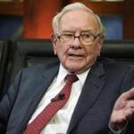 FILE- In this May 7, 2018, file photo Berkshire Hathaway Chairman and CEO Warren Buffett speaks during an interview in Omaha, Neb., with Liz Claman on Fox Business Network's 