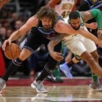 CHICAGO, ILLINOIS - FEBRUARY 23: Marcus Morris #13 of the Boston Celtics fouls Robin Lopez #42 of the Chicago Bulls as they battle for the ball at the United Center on February 23, 2019 in Chicago, Illinois. The Bulls defeated the Celtics 126-116. NOTE TO USER: User expressly acknowledges and agrees that, by downloading and or using this photograph, User is consenting to the terms and conditions of the Getty Images License Agreement. (Photo by Jonathan Daniel/Getty Images)