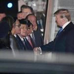 President Donald Trump is greeted after arriving on Air Force One at Noi Bai International Airport, in Hanoi, Vietnam, Tuesday, Feb. 26, 2019, ahead of his second summit with North Korea's Kim Jong Un, scheduled for Wednesday. (AP Photo/Susan Walsh)