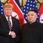 US President Donald Trump (left) shook hands with North Korean leader Kim Jong Un. 