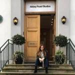 Pinar Toprak sits on the steps of Abbey Road Studios in London, where she recorded the score for ?Captain Marvel.? 