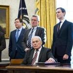 President Trump ordered then-chief of staff John Kelly (seated) to grant a top-secret security clearance to Jared Kushner (right), despite intelligence officials? concerns.