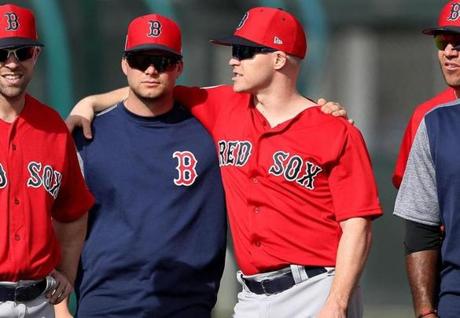 Fort Myers, FL - 2/21/2019 - Boston Red Sox left fielder Andrew Benintendi (16) and Boston Red Sox second baseman Brock Holt (12). Day 10 Red Sox Spring Training at JetBlue Park in Fort Myers, FL.. - (Barry Chin/Globe Staff), Section: Sports, Reporter: Peter Abraham, Topic: 22Red Sox, LOID: 8.5.480462370.
