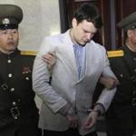 American student Otto Warmbier in the custody of North Korean soldiers in 2016.  