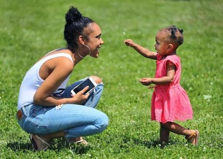 A Globe photographer captured this touching image of Jassy Correia playing with her daughter in June 2018.
