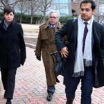 Insys Therapeutics founder John N. Kapoor (center) is on trial in federal court in Boston.