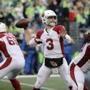 Arizona Cardinals quarterback Josh Rosen drops back to pass against the Seattle Seahawks during the second half of an NFL football game, Sunday, Dec. 30, 2018, in Seattle. (AP Photo/Ted S. Warren)