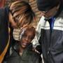 Carol Price was comforted at her home in Dorchester by Kim and Ronald Odom. Kendric Price, Carol?s son, was shot and killed early Saturday morning. Steven Odom, Kendric?s friend who was killed in 2007, was the Odoms? son.