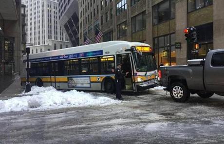 This MBTA bus was towed off the sidewalk on Franklin Ave. early Monday morning.

