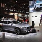 Workers prepared a Volvo V90 Cross Country for the opening of the Chicago Auto Show last month. 