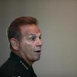 FILE - In this Thursday, Nov. 15, 2018, file photo, Broward County Sheriff Scott Israel speaks before the state commission in Sunrise, Fla. Israel, who was suspended by the governor and accused of failing to prevent the Parkland school shooting filed suit Thursday, March 7, 2019, seeking his job back and alleging Gov. Ron DeSantis improperly ousted him for political reasons. (AP Photo/Brynn Anderson, File)