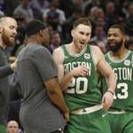 Boston Celtics forward Gordon Hayward, second from right, celebrates with teammates after the Celtics beat the Sacramento Kings 111-109 in an NBA basketball game, Wednesday, March 6, 2019, in Sacramento, Calif. Hayward scored the gaming winning basket in the closing seconds of the game. (AP Photo/Rich Pedroncelli)