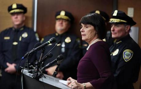 Cambridge, MA 01-03-19: Middlesex County District Attorney Marian Ryan (at microphone) and Cambridge Police Department Superintendent Steven DeMarco (far right) took questions from reporters at the department's headquarters concerning the murder of a man at Danehy Park in Cambridge. (Jim Davis/Globe Staff)
