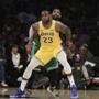 Los Angeles Lakers' LeBron James, front, is pressured by Boston Celtics' Kyrie Irving during the second half of an NBA basketball game, Saturday, March 9, 2019, in Los Angeles. The Celtics won 120-107. (AP Photo/Jae C. Hong)