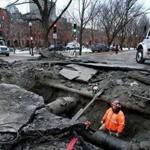 A crew worked to repair a water main break at the intersection of Commonwealth Avenue and Exeter Street in Boston on Tuesday. 