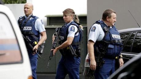 MOSQUE SHOOTING SLIDER Armed police patrol outside a mosque in central Christchurch, New Zealand, Friday, March 15, 2019. A witness says many people have been killed in a mass shooting at a mosque in the New Zealand city of Christchurch. (AP Photo/Mark Baker)
