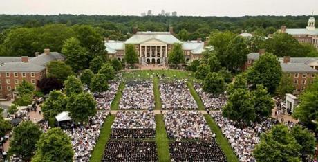 This May 21, 2018 photo shows the Wake Forest University commencement on Hearn Plaza, in Winston-Salem, N.C. Dozens of people were charged Tuesday, March 12, 2019, in a scheme in which wealthy parents allegedly bribed college coaches and other insiders to get their children into some of the nation's most elite schools. The coaches worked at such schools as Wake Forest, Yale, Stanford, Georgetown, the University of Texas, the University of Southern California and the University of California, Los Angeles. ()
